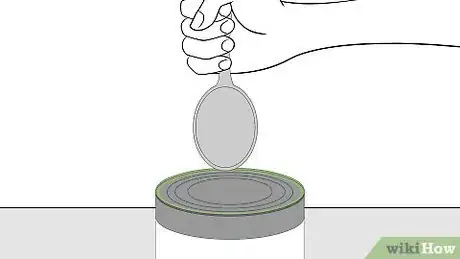 Image titled Open a Can Without a Can Opener Step 8