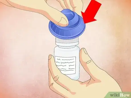Image titled Open a Child Proof Pill Container Step 12