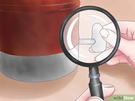 Image titled Build a Fire in a Woodburning Heater Step 1