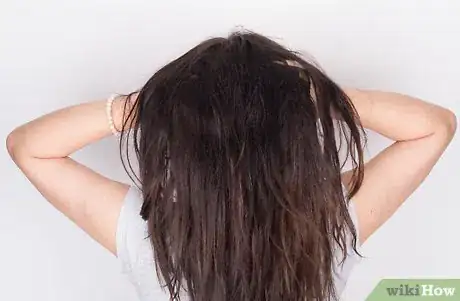 Image titled Get Shiny Hair While Using a Flat Iron Step 6