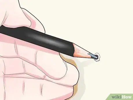 Image titled Find a Wood Stud in a Wall to Hang Pictures On Step 1