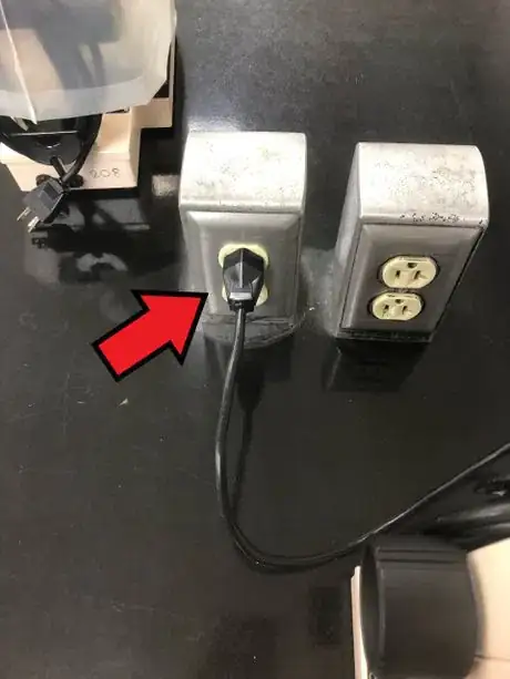 Image titled Power cord plugged in