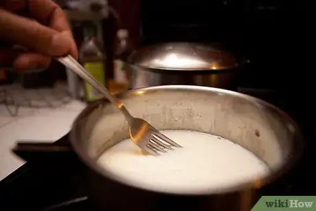 Image titled Stop Skin Forming on Milk Step 1