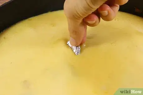 Image titled Bake a Ring Into a Cake or Other Food Step 5