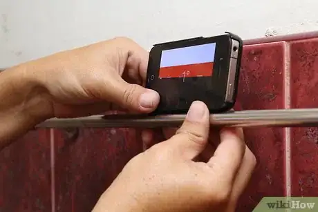 Image titled Hang Towel Racks Step 7