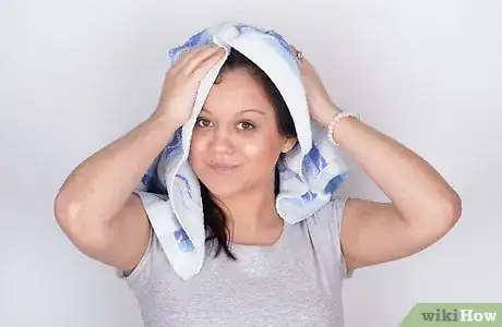 Image titled Get Shiny Hair While Using a Flat Iron Step 4