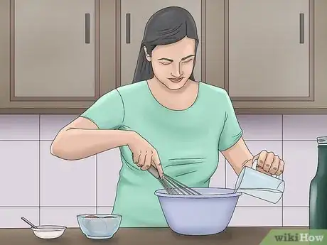 Image titled Make a 3D Dinosaur Birthday Cake Step 1