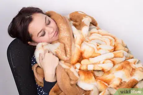 Image titled Sleep on a Chair Step 8