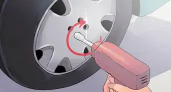 Install Brake Calipers on Car Wheels