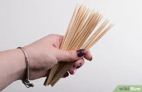 Image titled Curl Hair with Chopsticks Step 3