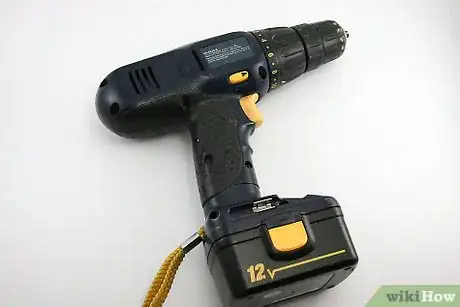 Image titled Sharpen a Knife With a Powerdrill and Sandpaper Step 1