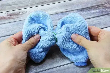 Image titled Fold Towel Butterflies Step 2