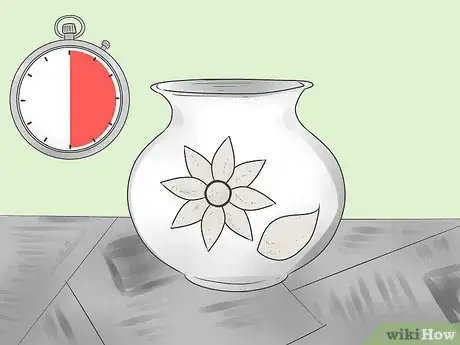 Image titled Create a Raised M‐Seal Design for a Painted Terracotta Pot Step 11