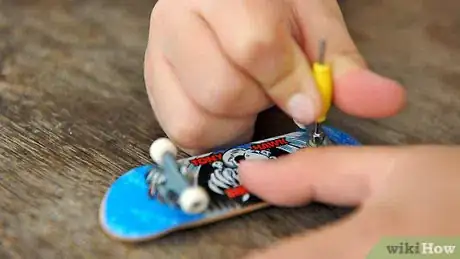 Image titled Tighten Your Wheels and Trucks on a Tech Deck Step 7