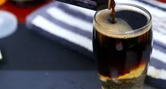 Pour a Guinness Bass Black and Tan