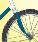 Convert Bicycle Tires Into Studded Snow Tires