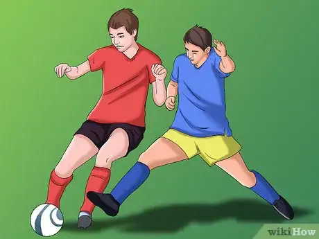 Image titled Slide Tackle in Football_Soccer Step 2