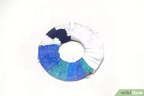 Image titled Make Scrap Fabric Pom Poms Step 4