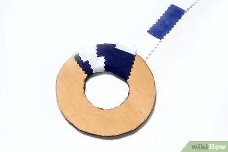 Image titled Make Scrap Fabric Pom Poms Step 3