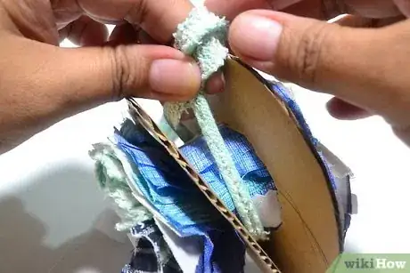 Image titled Make Scrap Fabric Pom Poms Step 6