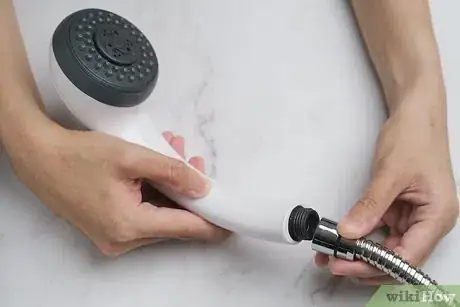 Image titled Clean a Shower Head Step 1