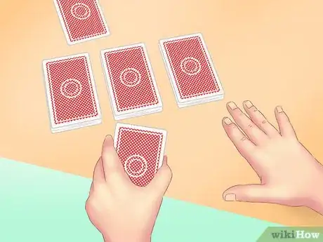 Image titled Make a Card Fall Through a Table Step 3