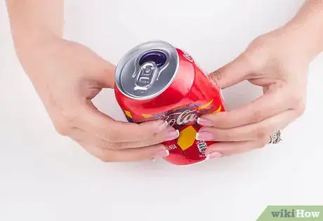 Image titled Do the Soda Can Magic Trick Step 3