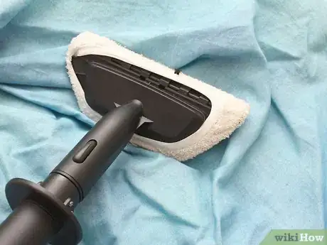 Image titled Get Wrinkles Out of Muslin Backdrops Step 1