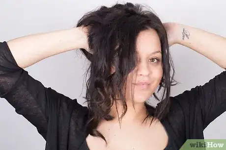 Image titled Wave Your Hair With a Flat Iron Step 8