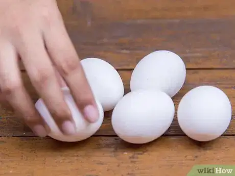 Image titled Make an Egg Smoke Bomb Step 1