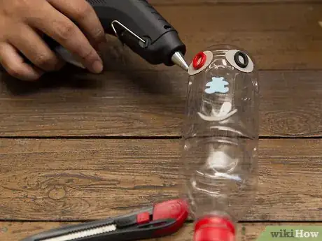 Image titled Make a Puppet with an Empty Bottle and a Broom Stick Step 6