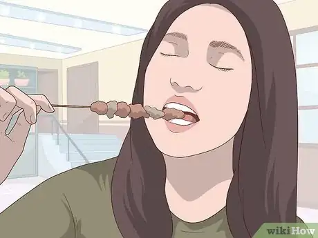 Image titled Eat Food on a Stick Step 1.jpeg