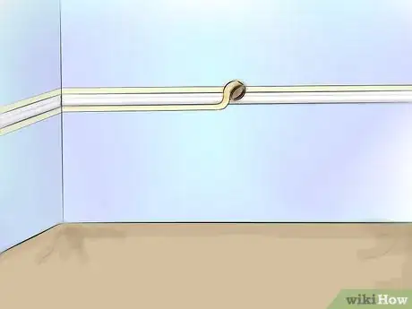 Image titled Paint a Wall Chair Rail Step 4