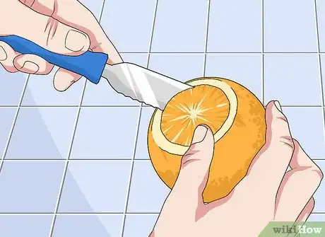 Image titled Bake a Cake Inside a Hollowed Orange over a Campfire Step 2