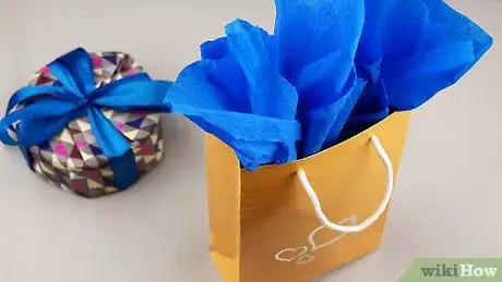 Image titled Wrap Cylindrical Gifts Step 18