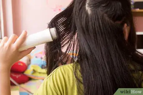 Image titled Straighten Hair with a Roller Brush Step 13