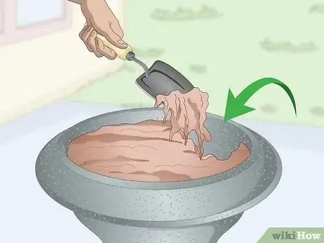 Image titled Plant in Urns Step 4