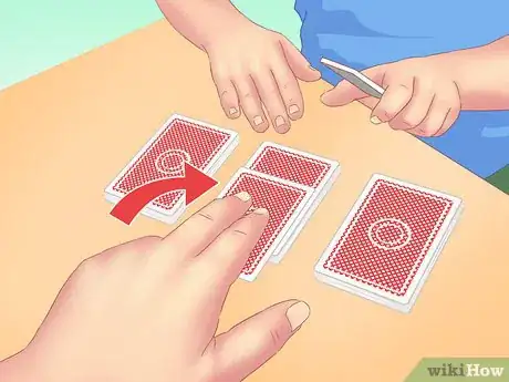 Image titled Make a Card Fall Through a Table Step 5