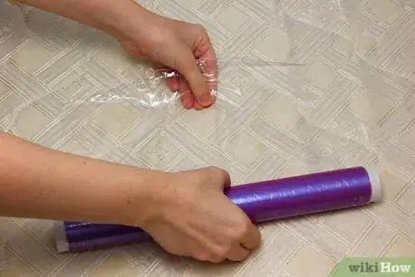 Image titled Use Hardware Store Plastic Sheeting as a Bedwetting Sheet Step 3