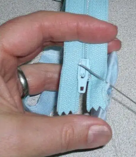 Image titled RP13 zipper to inside