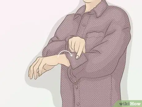 Image titled Roll Up Shirt Sleeves Step 3