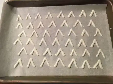 Image titled Cat_Themed_Cupcakes_WhiteEars.jpeg