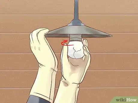 Image titled Remove a Broken Lightbulb from the Socket Step 6