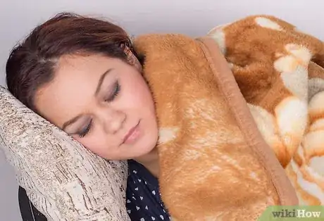 Image titled Sleep on a Chair Step 9