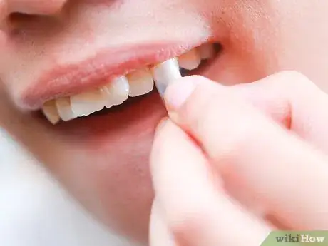 Image titled Make Easy Vampire Fangs Step 6