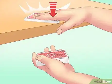 Image titled Make a Card Fall Through a Table Step 9