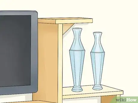 Image titled Decorate Entertainment Center Shelves Step 14