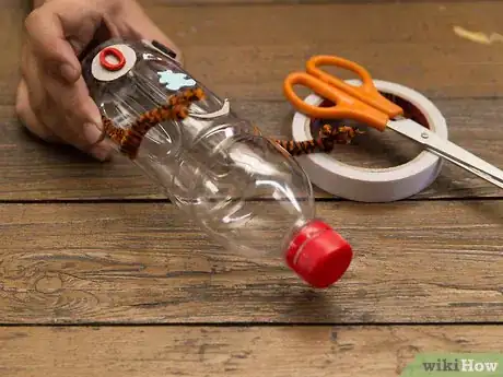 Image titled Make a Puppet with an Empty Bottle and a Broom Stick Step 7