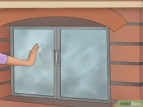 Image titled Clean Fireplace Glass Step 1