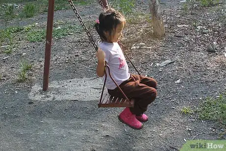 Image titled Jump off a Swing Safely Step 2